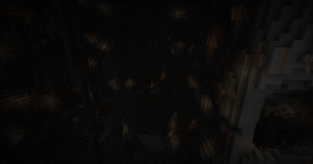 A vast subterranean dripstone cave stretching beneath the mountain village