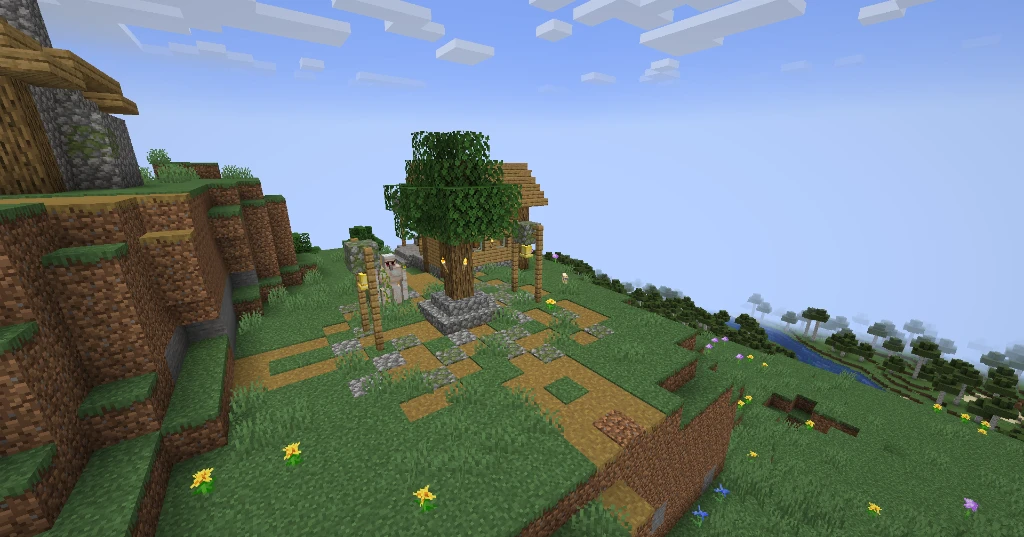 The mountain village town square with a cobblestone bell shrine, gathering tree, and resident Iron Golem