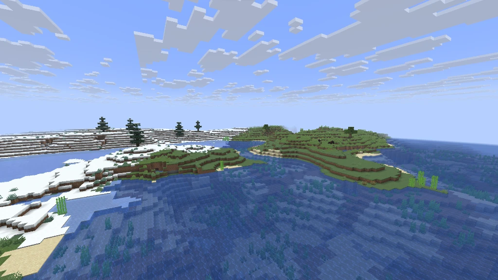 The island coastline where snowy cliffs and green meadows meet the open ocean
