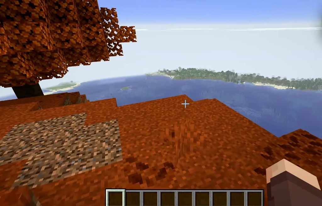 First-person perspective from the Dappled Forest plateau looking across the ocean towards the mainland coastline